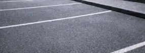 Clean parking lot after spring sweeping in Durham Region with clear parking lines and debris-free surface