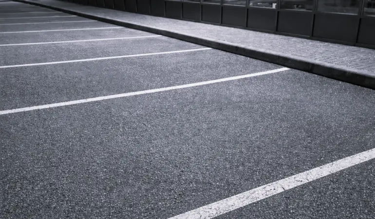 Clean parking lot after spring sweeping in Durham Region with clear parking lines and debris-free surface